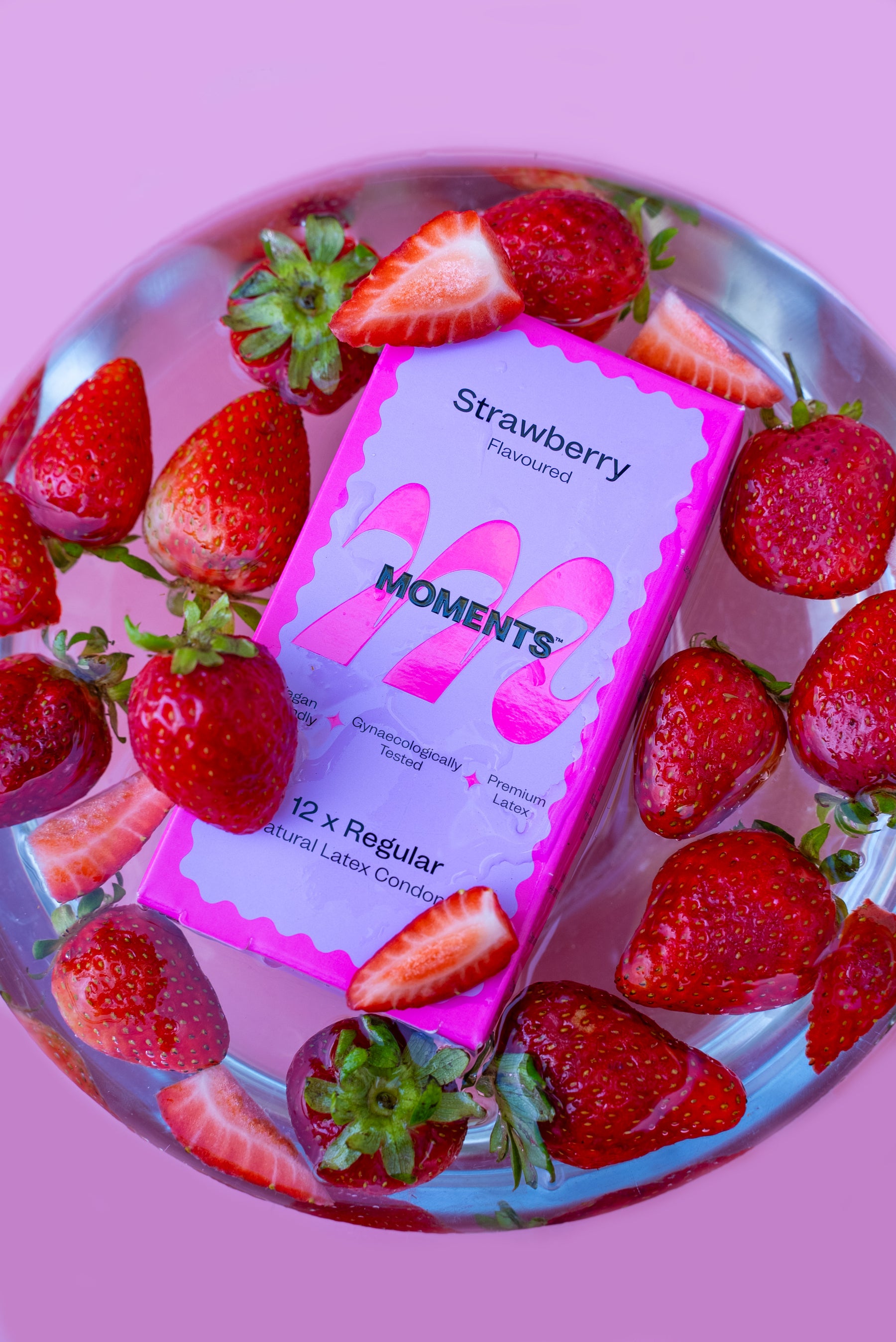 Moments Strawberry product displayed with fresh strawberries