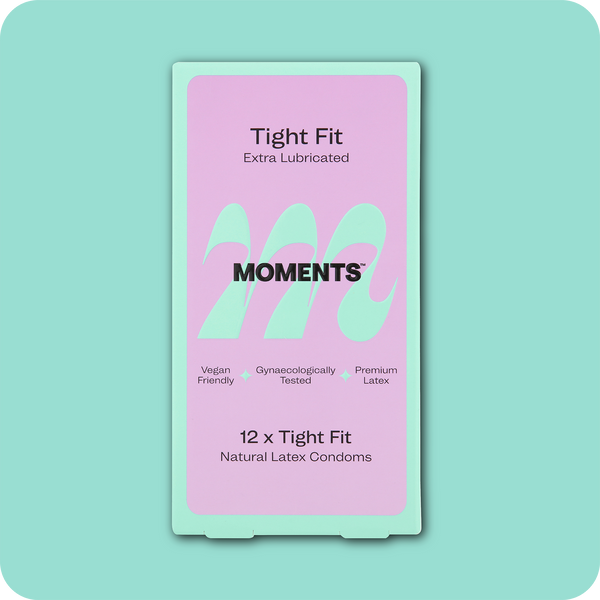 Box of Moments Tight Fit condoms with product branding
